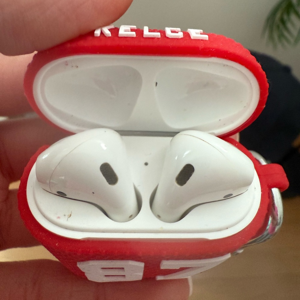 Used Apple AirPods, 2nd generation. NFL brand Kansas City Chiefs case.